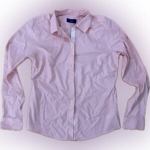 Baby pink button up shirt.